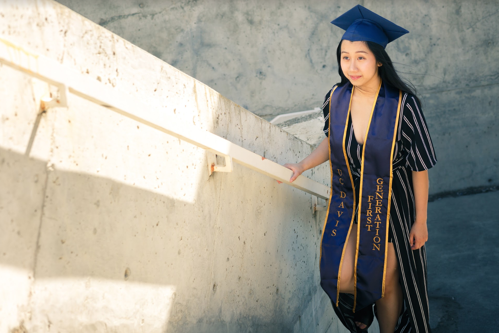 Kathy Pham walks up the staircase in her first-generation stole. 
