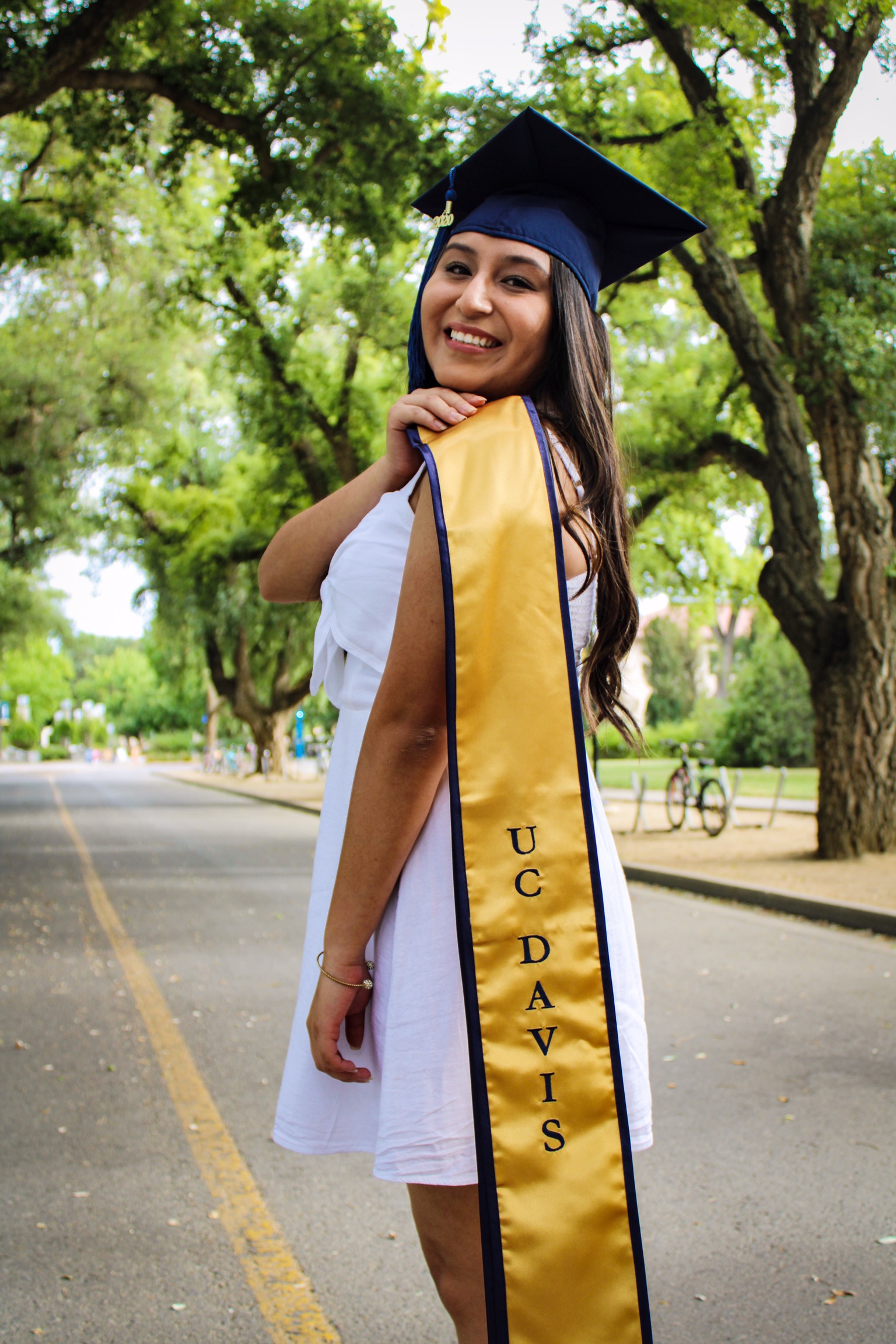 First Gen college grad Jessica Bueno in her graduation cap and stole