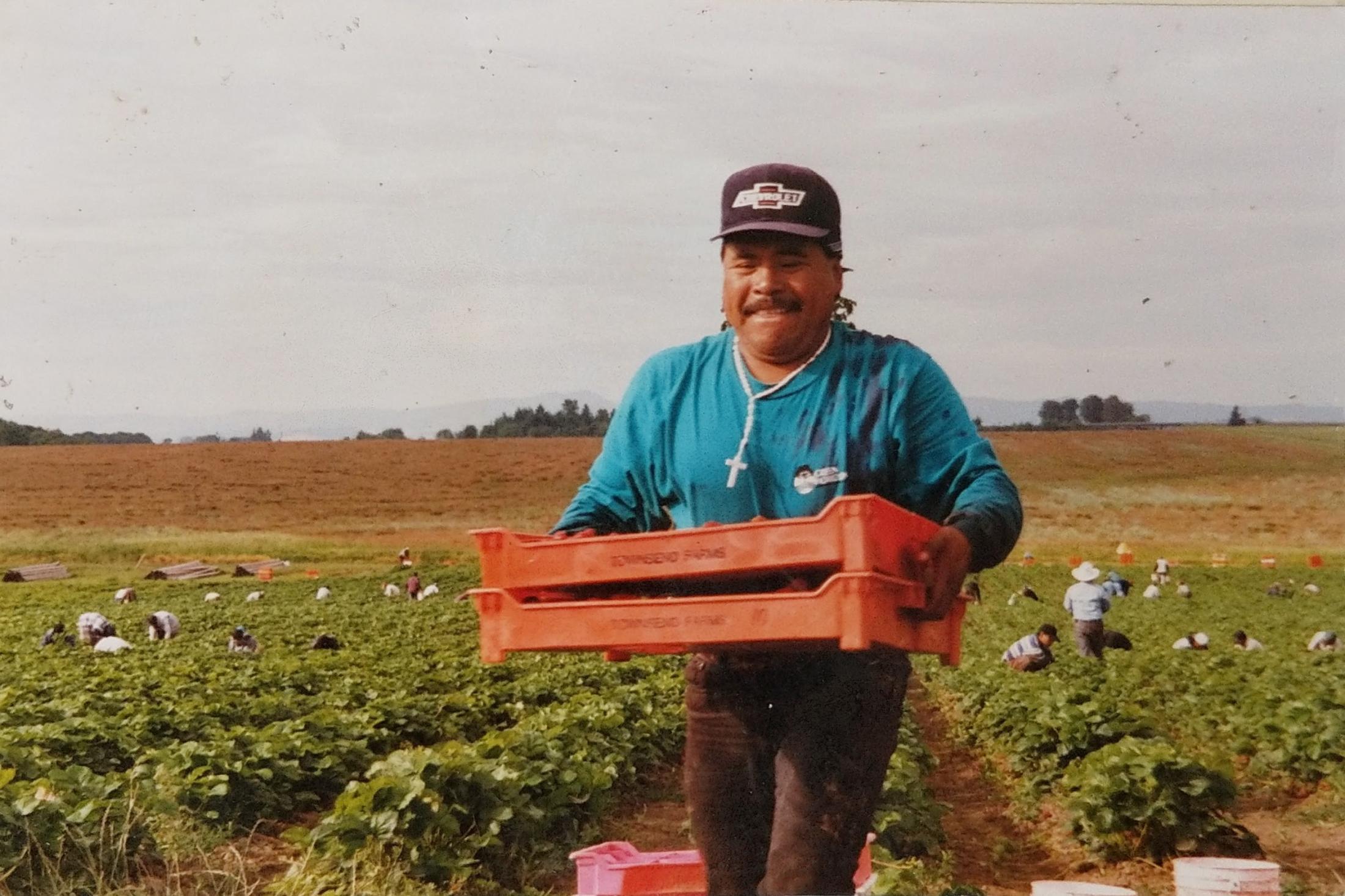 Yilda's father working outside 