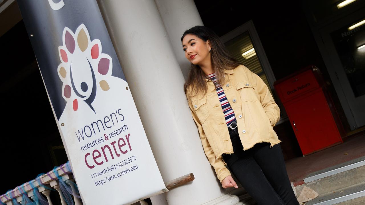 Jessica Ison standing in front North Hall, home to the WRRC.  