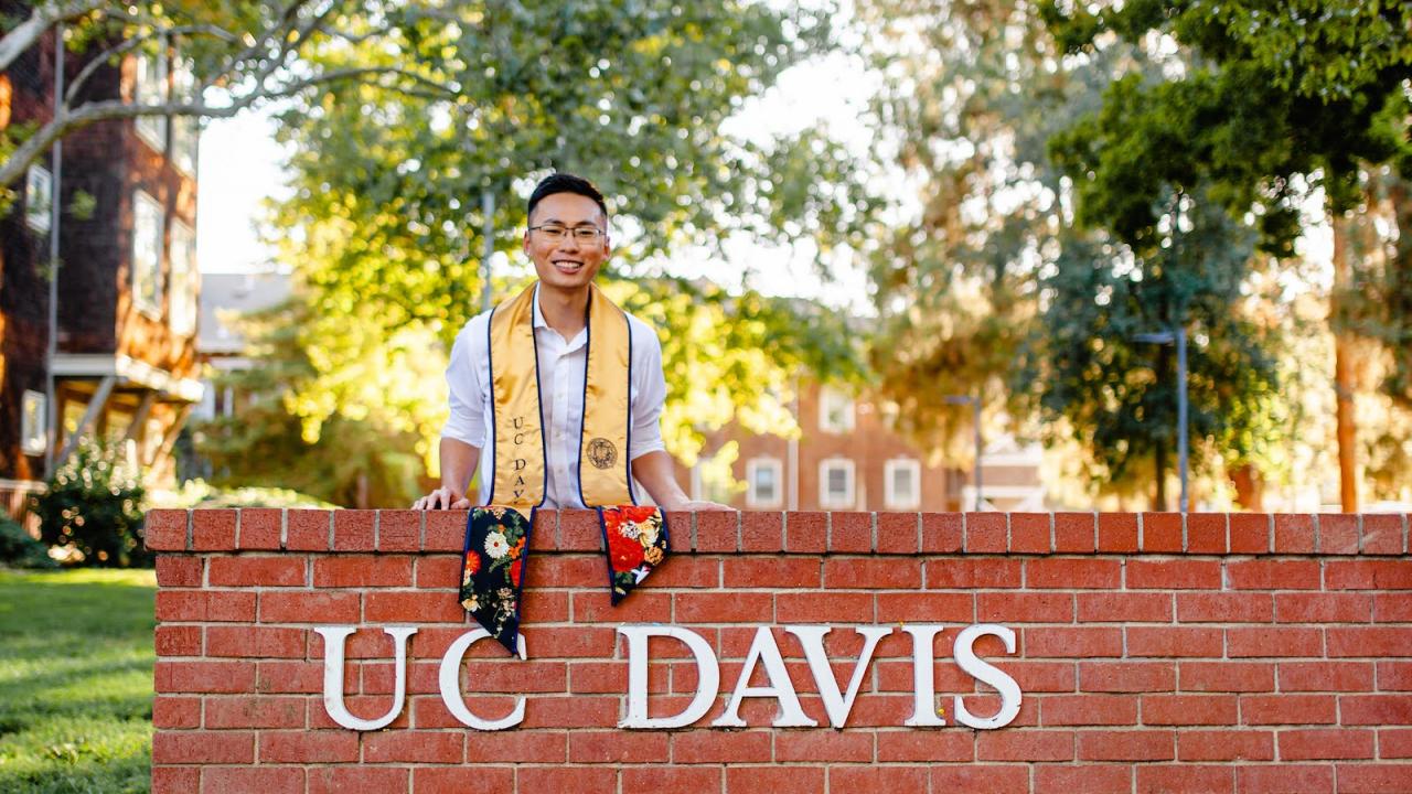 Eric Thai at the UC Davis brick gate