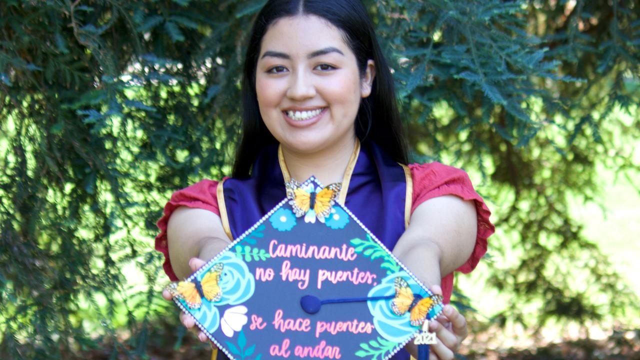 Paula Soto '21 with her decorated grad cap